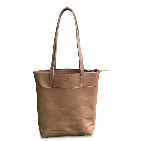 Brown leather tote bag on a white background