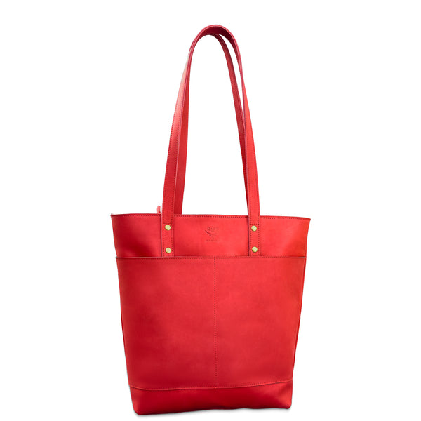 Red tote bag with gold buttons on a white background