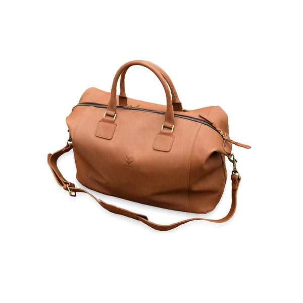 Brown leather travel bag with a strap 