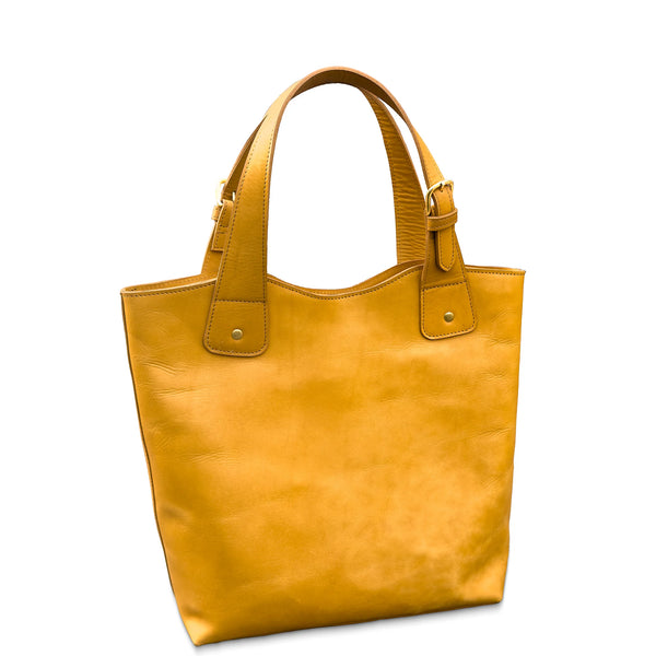 Tan tote bag on a white background