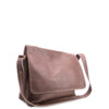 Brown leather shoulder bag on a white background