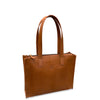 Brown leather tote bag on a white background