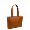Brown leather tote bag on a white background