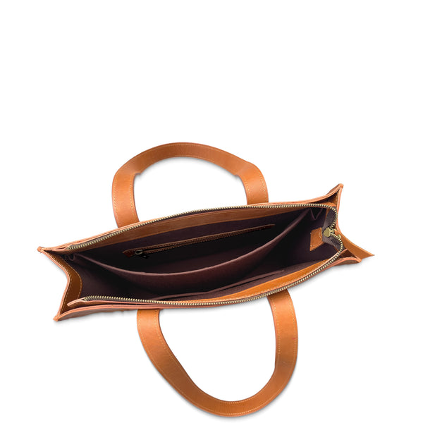 Brown leather handbag with open front compartment on a white background