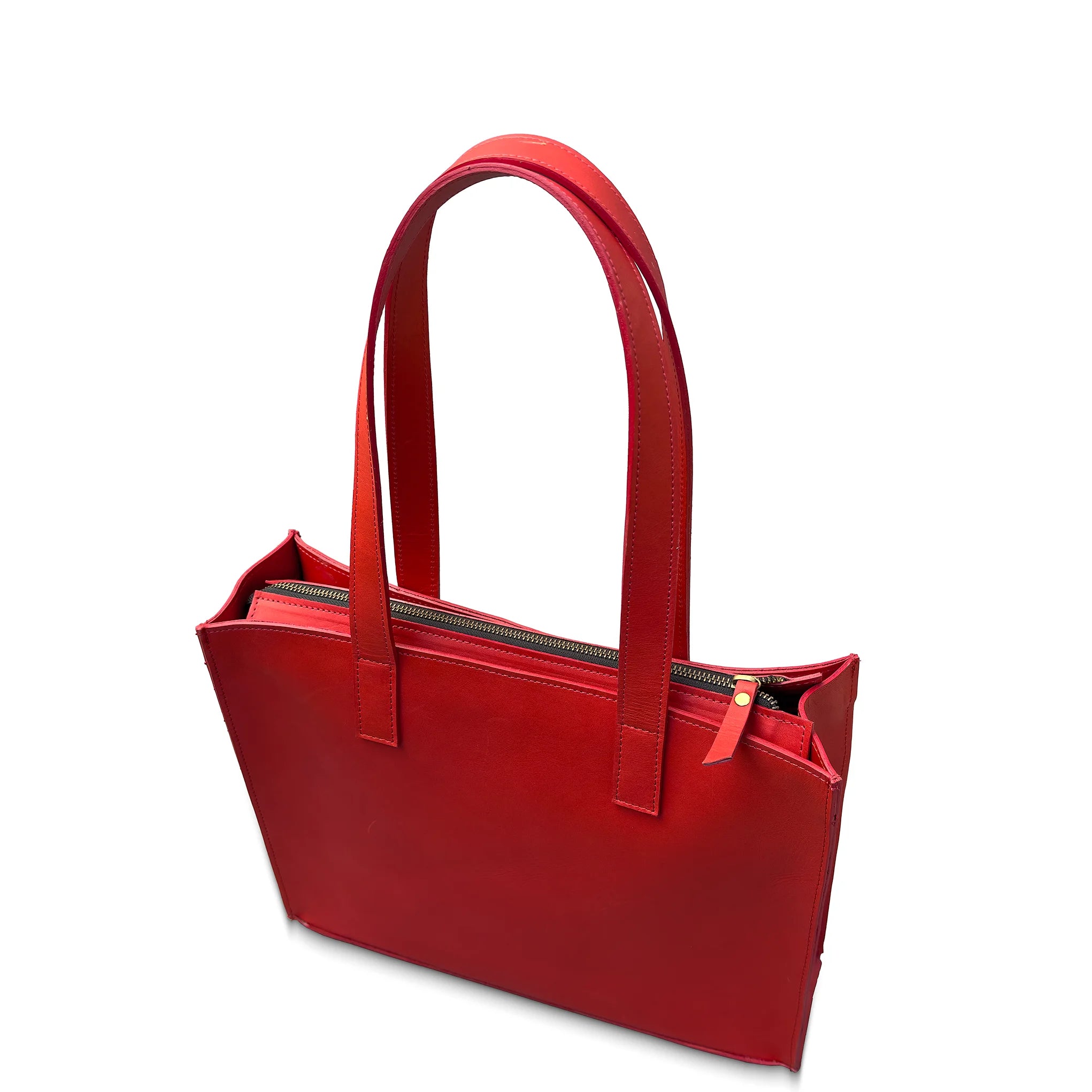 Red leather tote bag on a white background