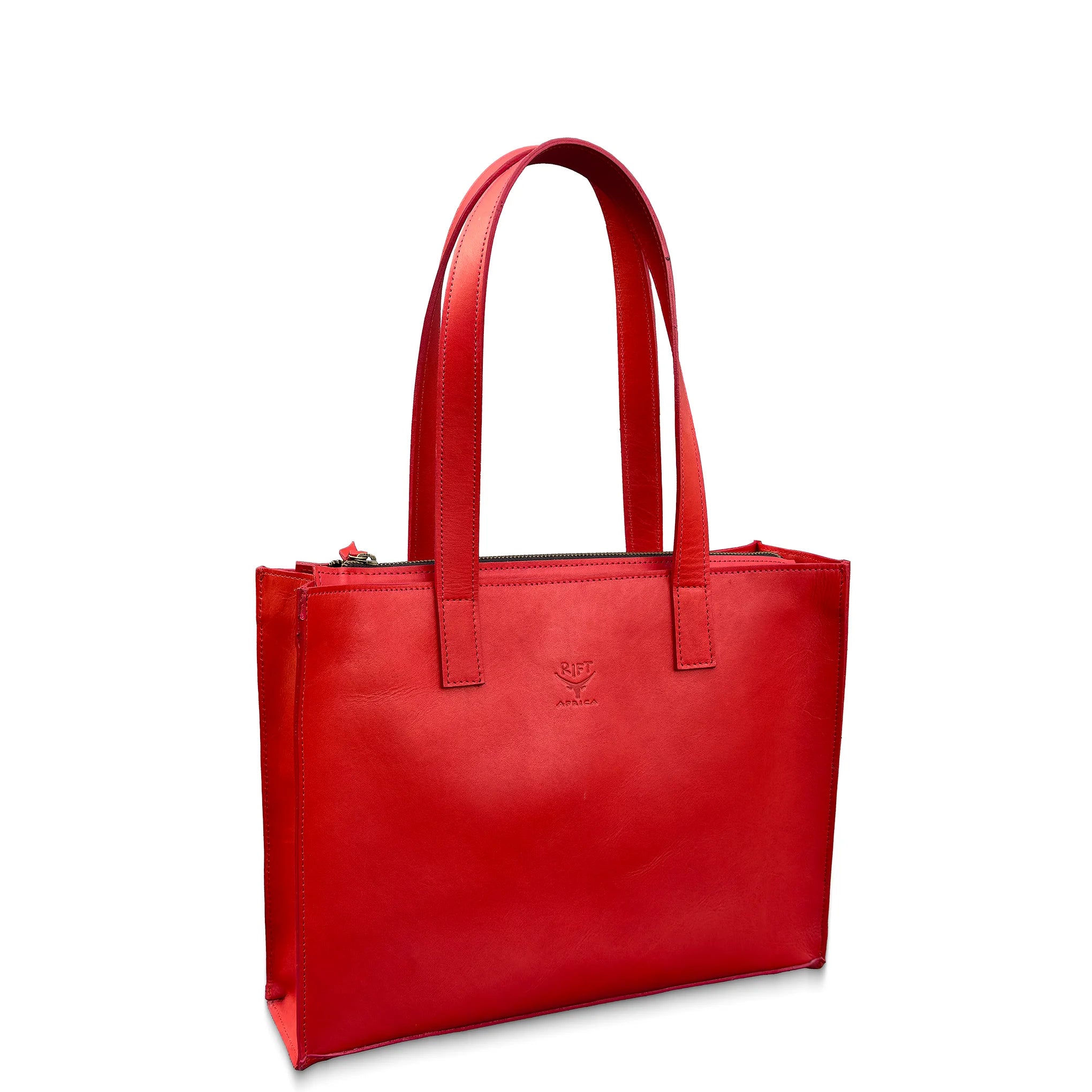 Red leather tote bag on a white background
