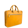 Tan leather briefcase with gold zipper pulls on a white background