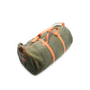 Green duffel bag with orange straps on a white background