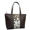 Brown tote bag with cow print panel on a white background