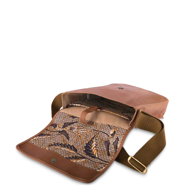 Brown leather bag with floral pattern and gold strap on a white background
