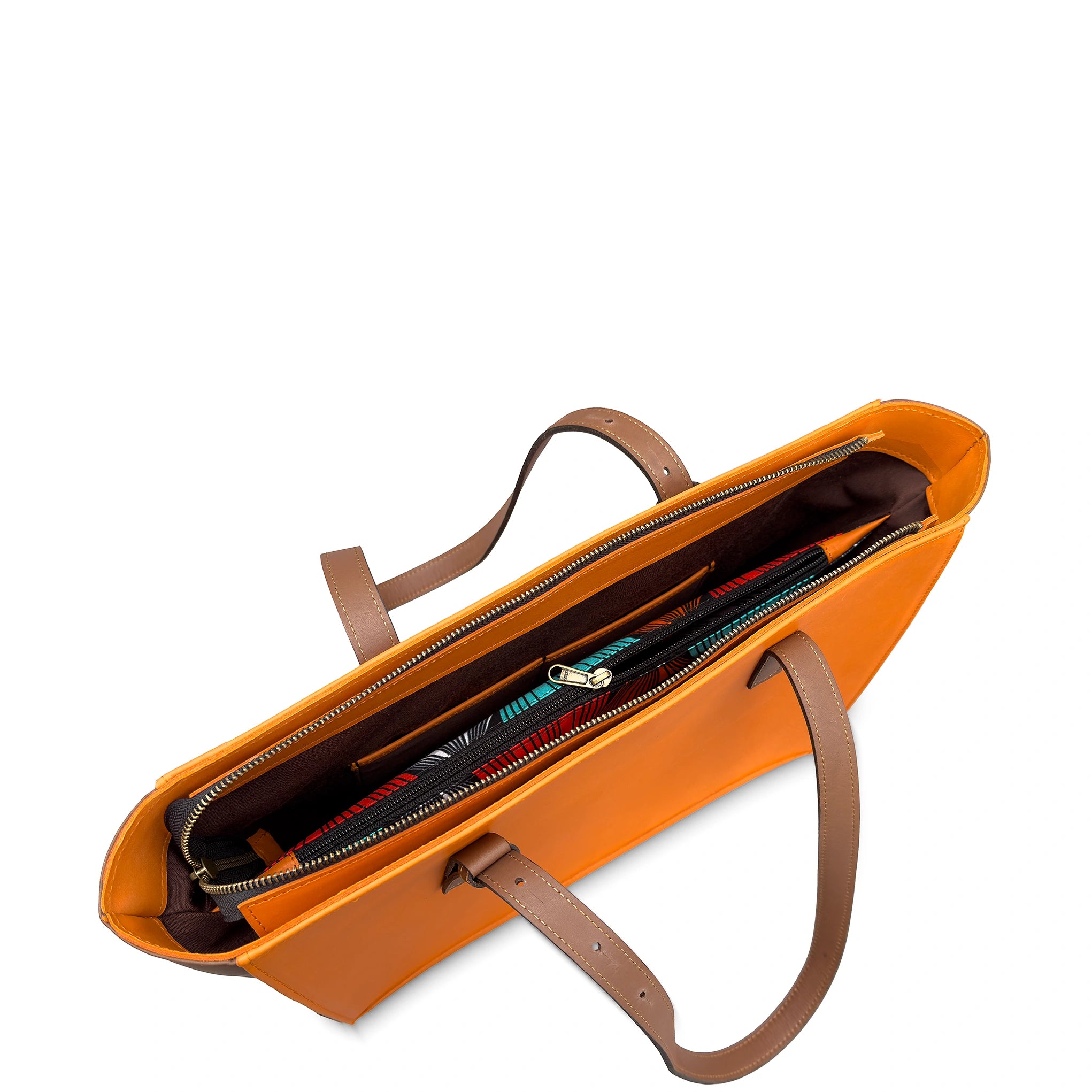 Orange leather handbag with brown handles on a white background