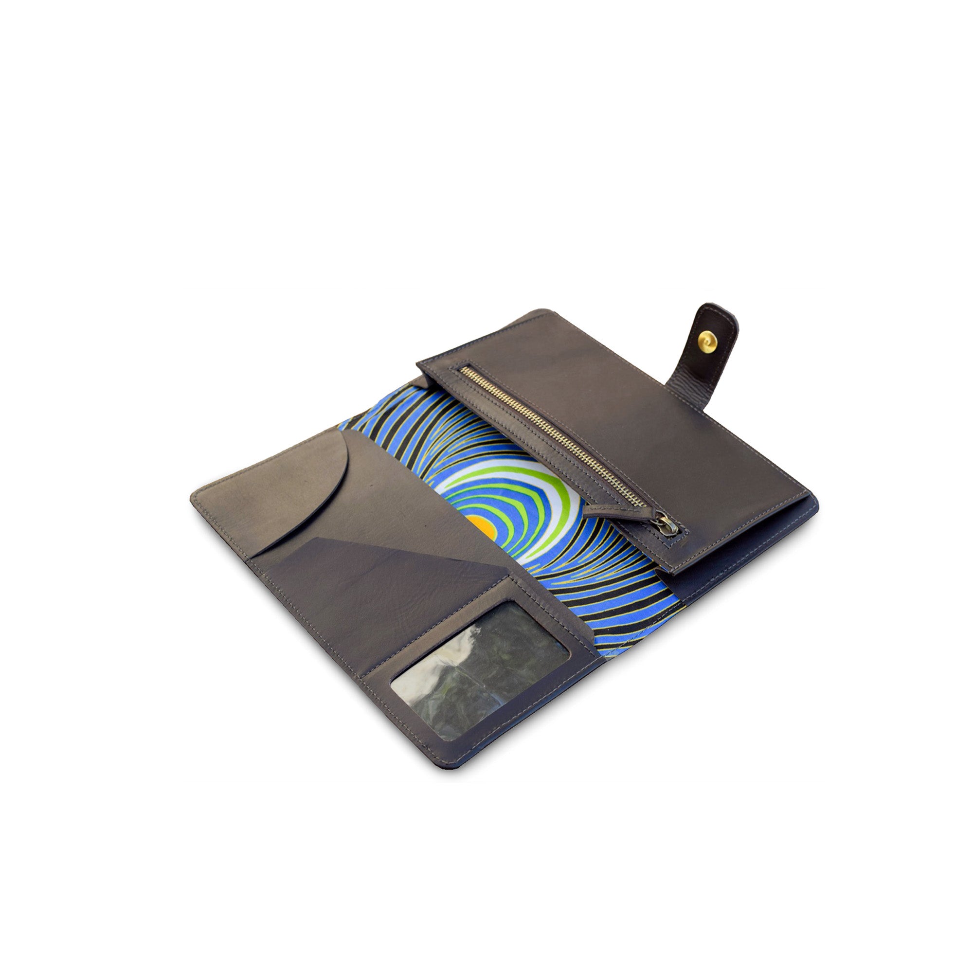 Brown leather travel wallet with a colorful interior on a white background