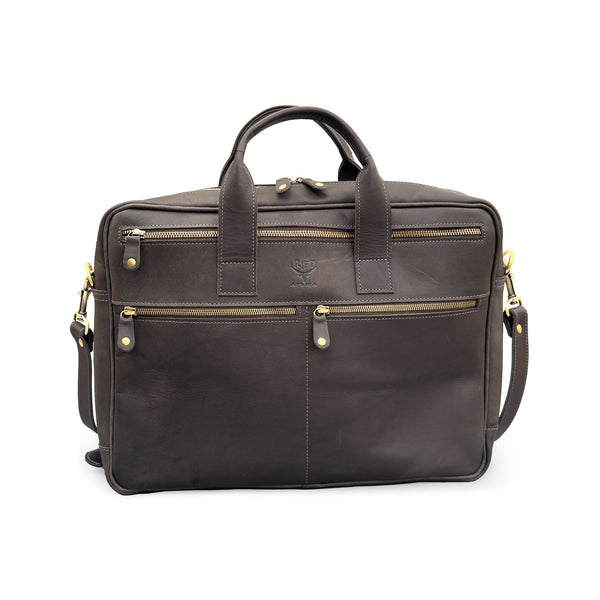 Brown leather bag with gold zippers on a white background