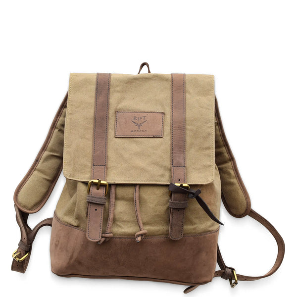 Brown backpack with leather straps on a white background