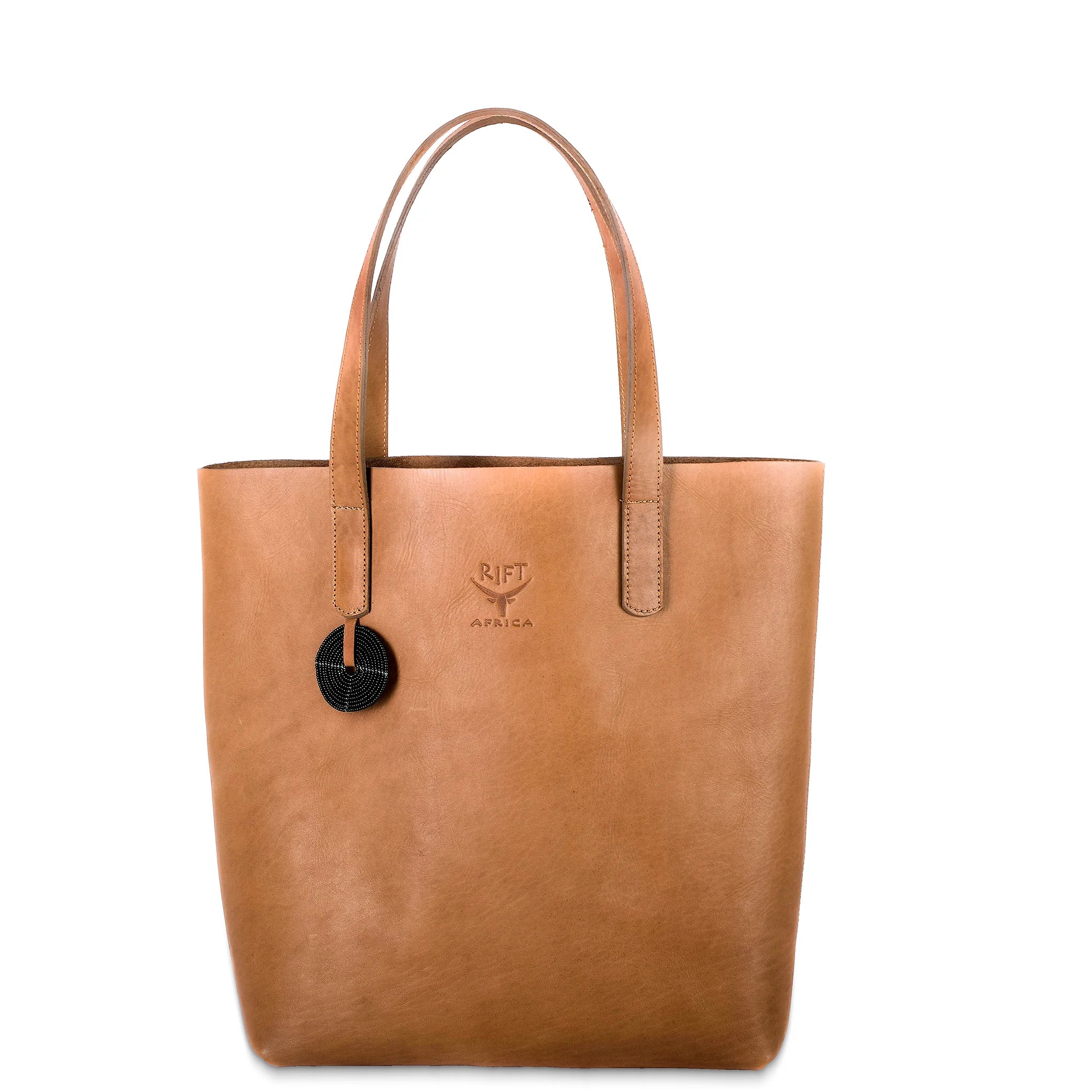 Brown leather tote bag with a visible brand logo on a white background