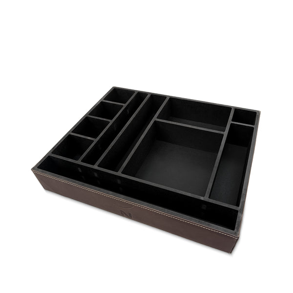 Black leather desk organizer with compartments on a white background