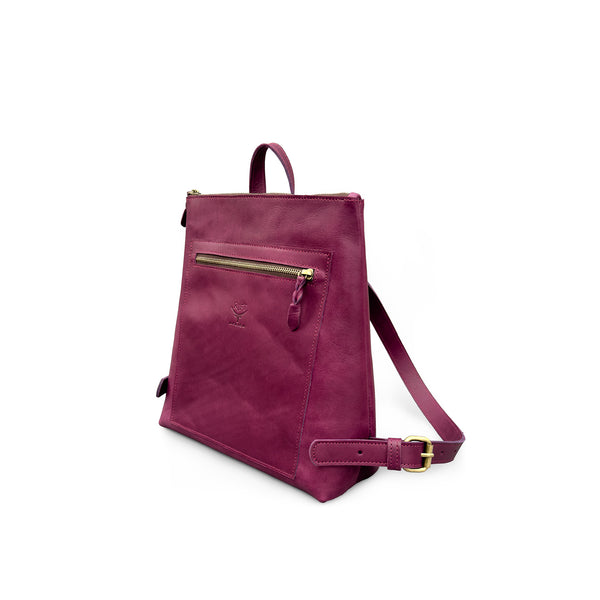 Purple leather backpack with gold zipper and strap on a white background