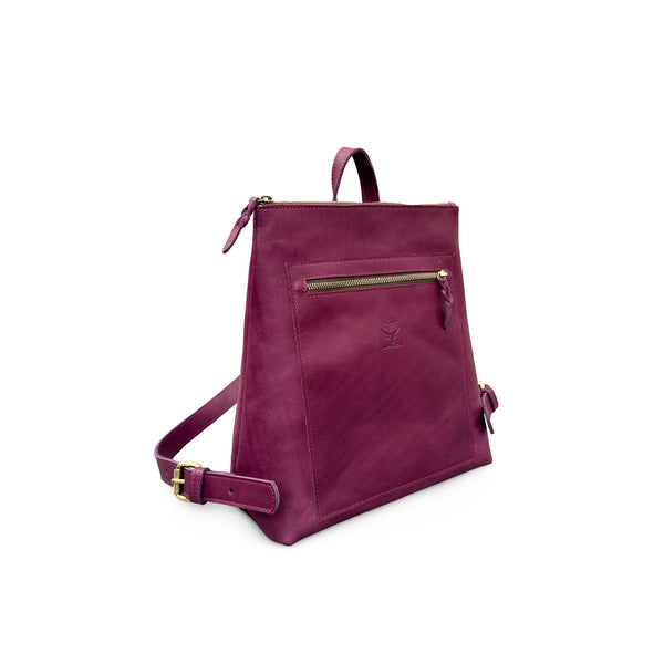 Purple leather backpack with a gold zipper on a white background