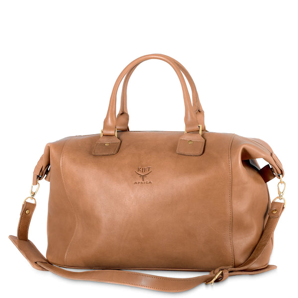 Brown leather bag with a visible brand logo on a white background