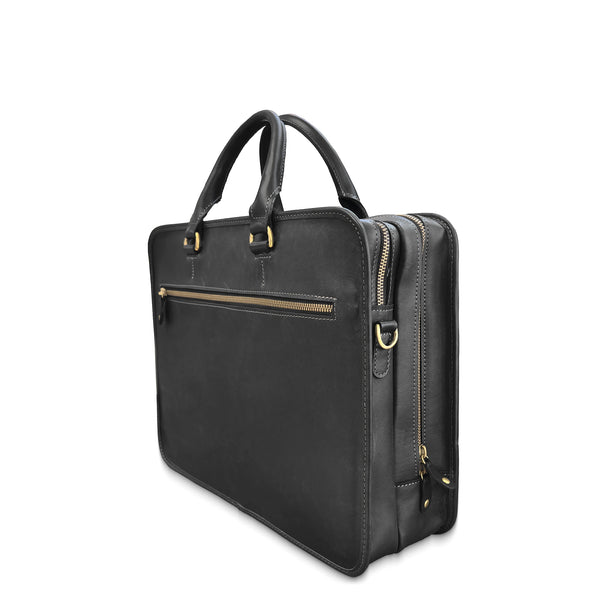 Black leather briefcase with gold zippers on a white background