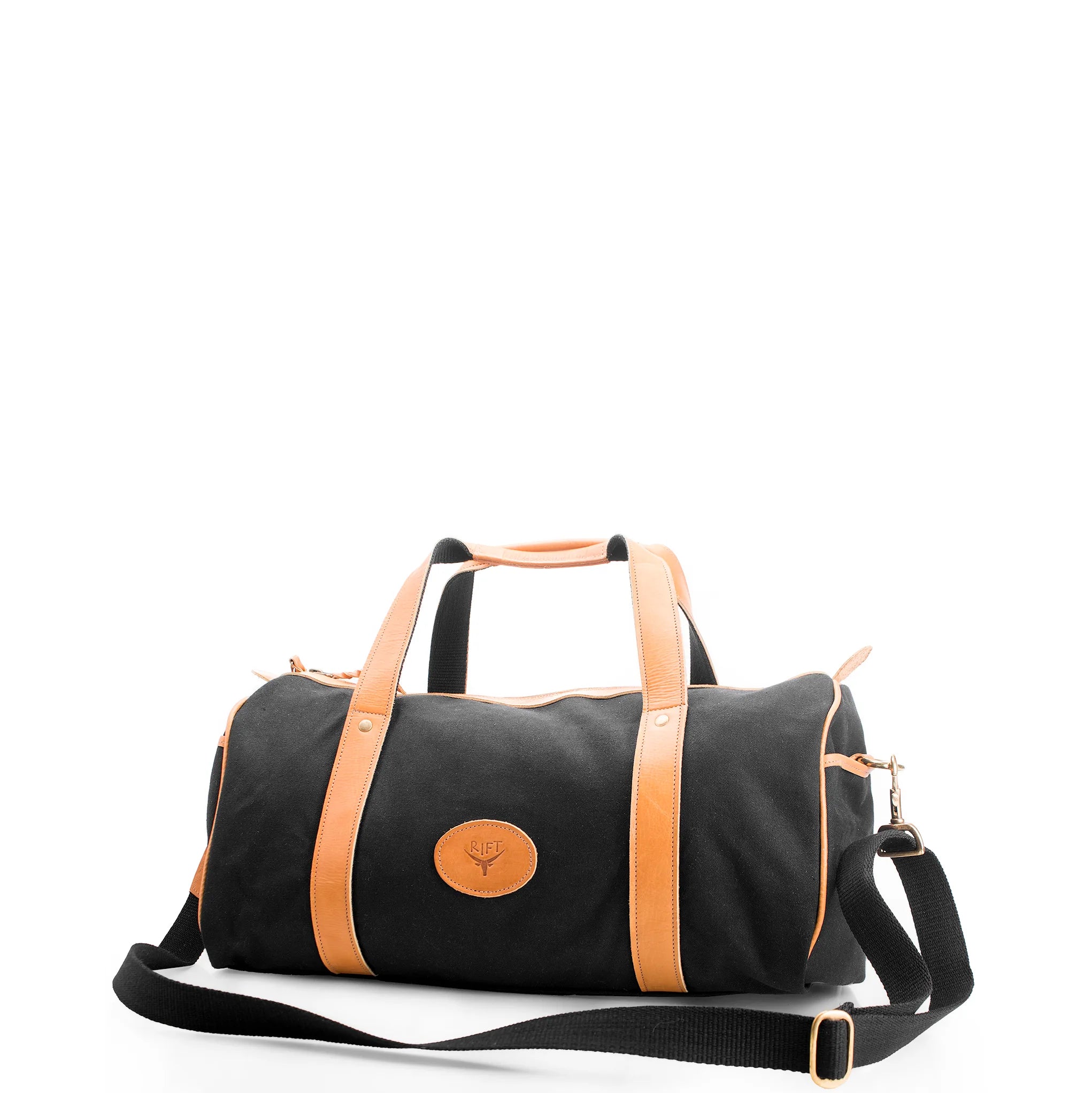 Black duffel bag with brown leather straps on a white background