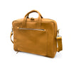 Brown leather briefcase with shoulder strap on a white background