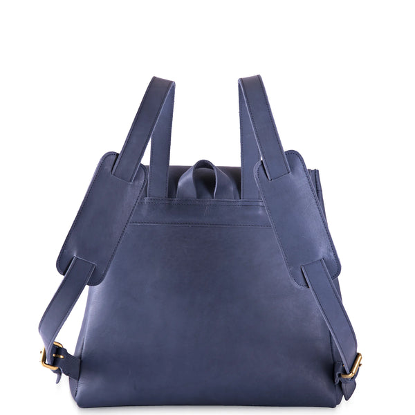 Blue leather backpack on a white background