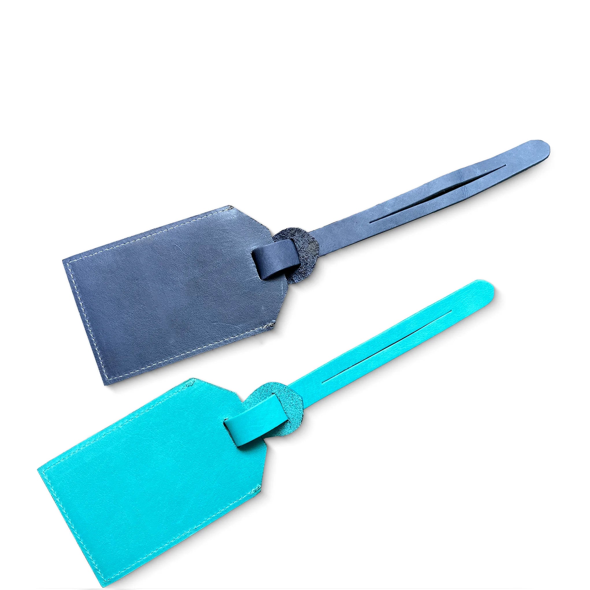 Two leather luggage tags, one blue and one turquoise, on a white background.