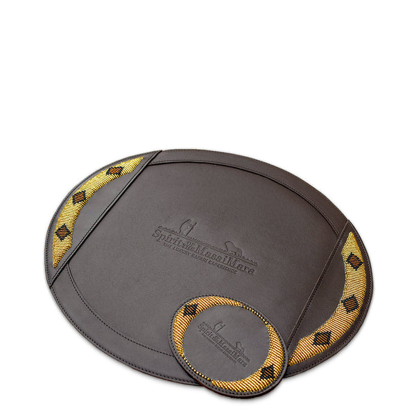 brown beaded leather placemat with  brand logo on a white background