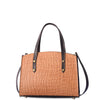Brown textured handbag with black straps on a white background