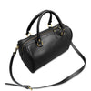 Black leather handbag with gold accents on a white background
