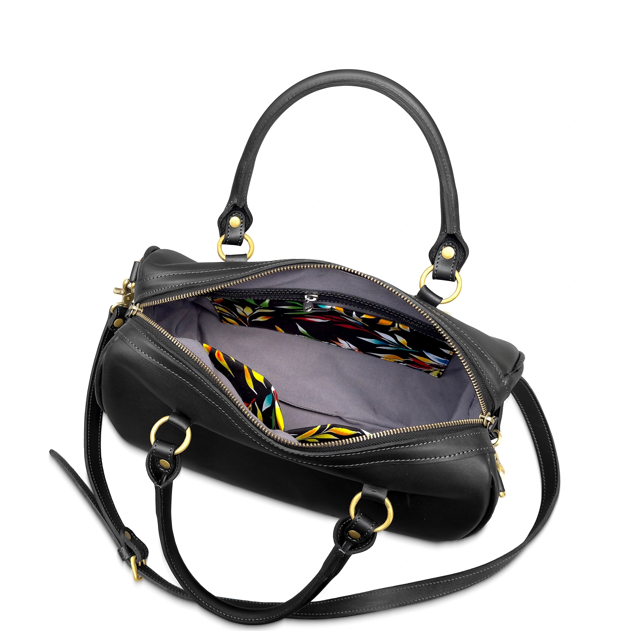 Black handbag with colorful interior lining on a white background