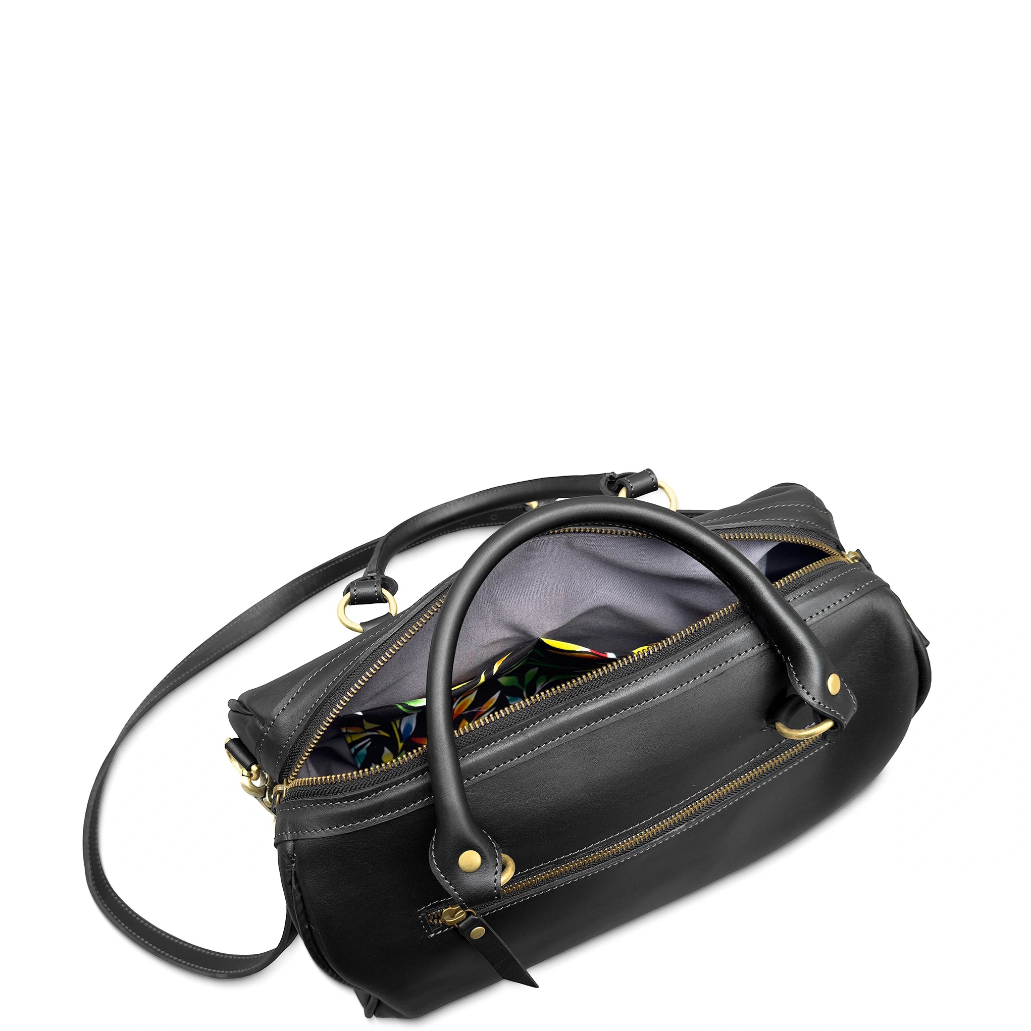 Black handbag with gold zippers on a white background