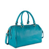 Turquoise handbag with gold accents on a white background