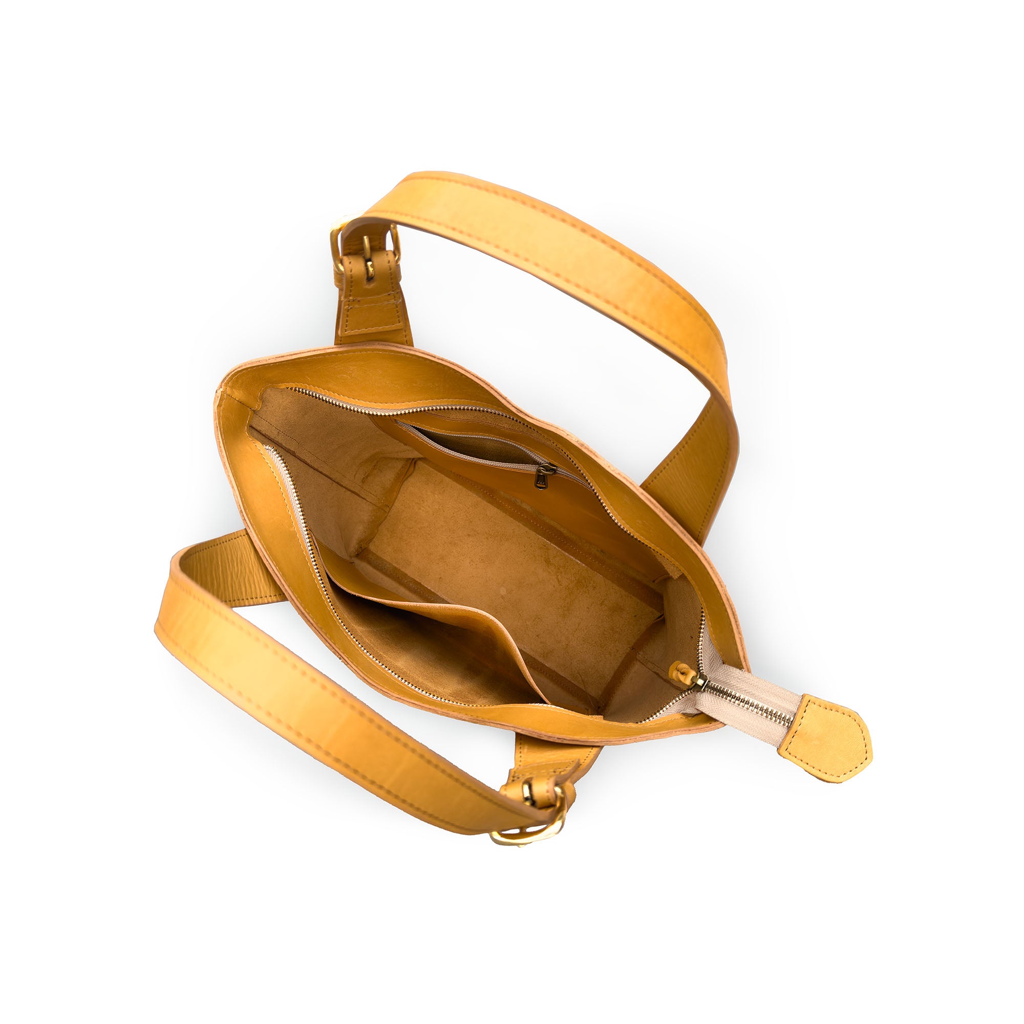 Yellow leather handbag with a strap on a white background