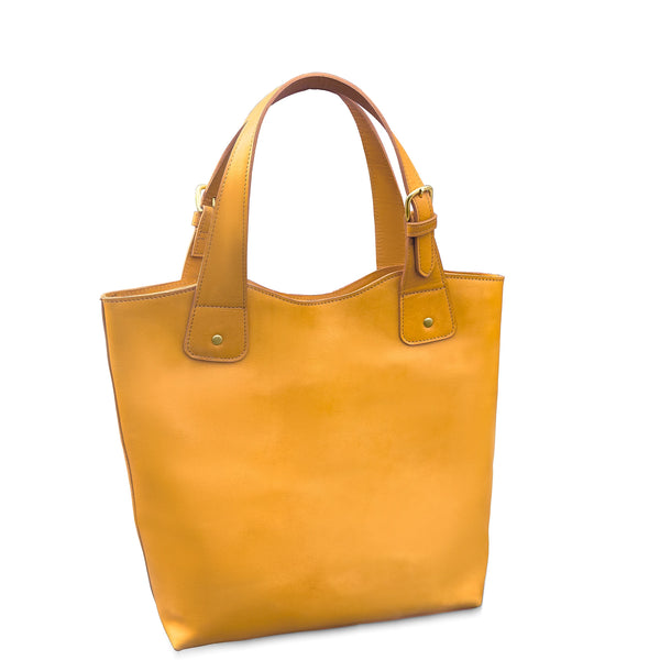 Yellow tote bag with a strap on a white background