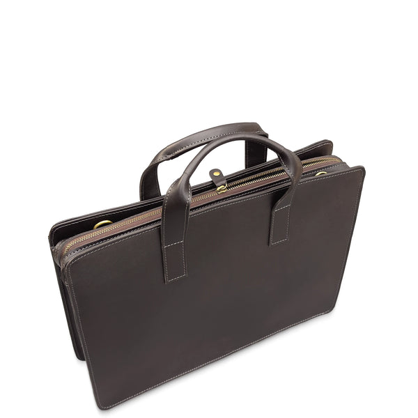 Brown leather briefcase with gold zipper pulls on a white background