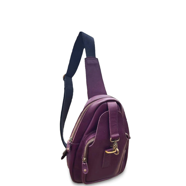 Purple sling bag with a gold zipper on a white background