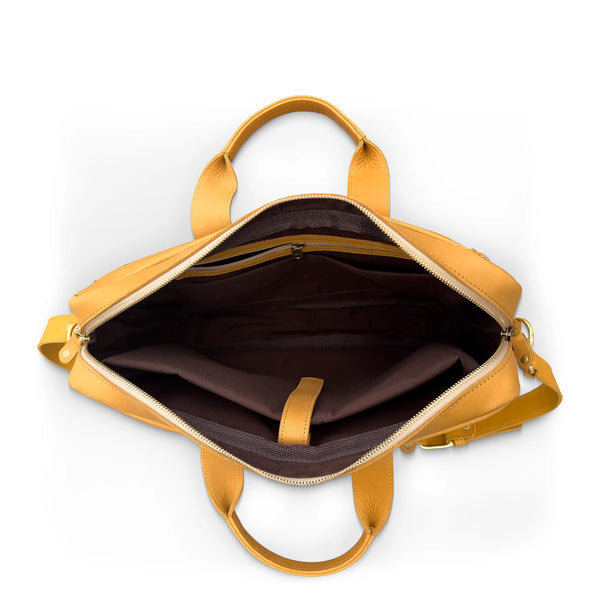 Tan briefcase with open front compartment on a white background