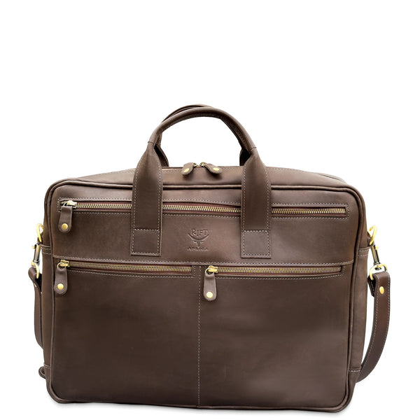 Brown leather briefcase with gold zippers on a white background