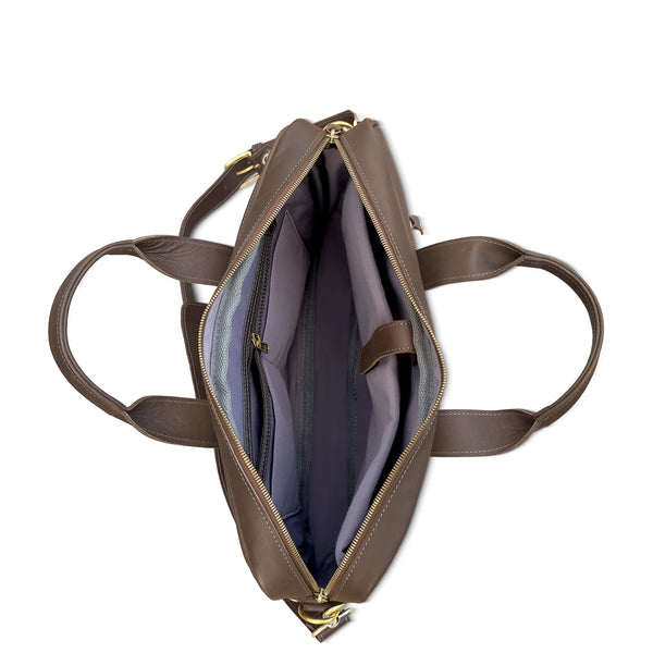 Brown leather handbag with open front showing interior on a white background