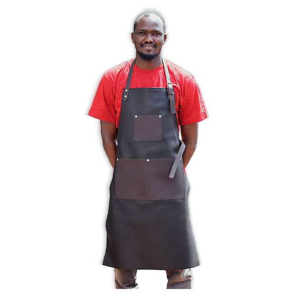Man wearing a black leather  apron over a red shirt on a white background