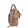 Brown leather backpack with gold zipper pull on a white background