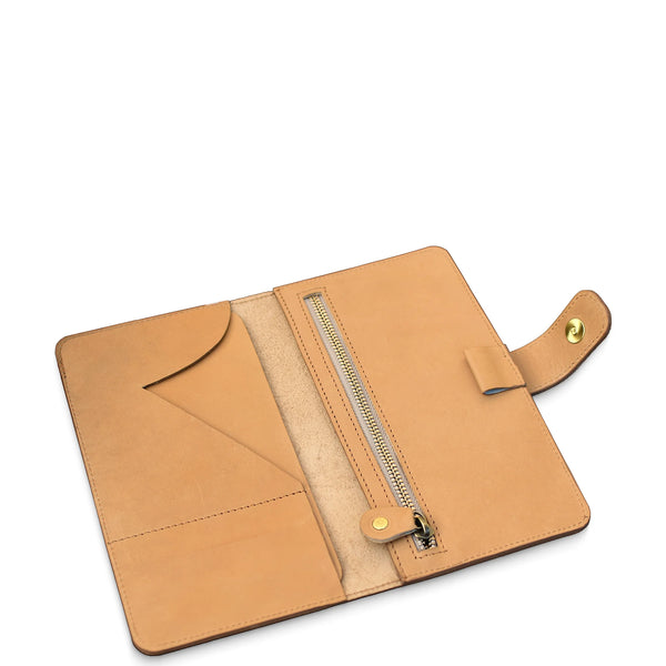 Tan leather wallet with zipper on a white background