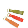 Three leather keychains in green, red, and orange on a white background