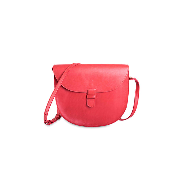Red leather crossbody bag on a white background