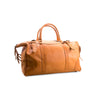Brown leather duffel bag on a white background