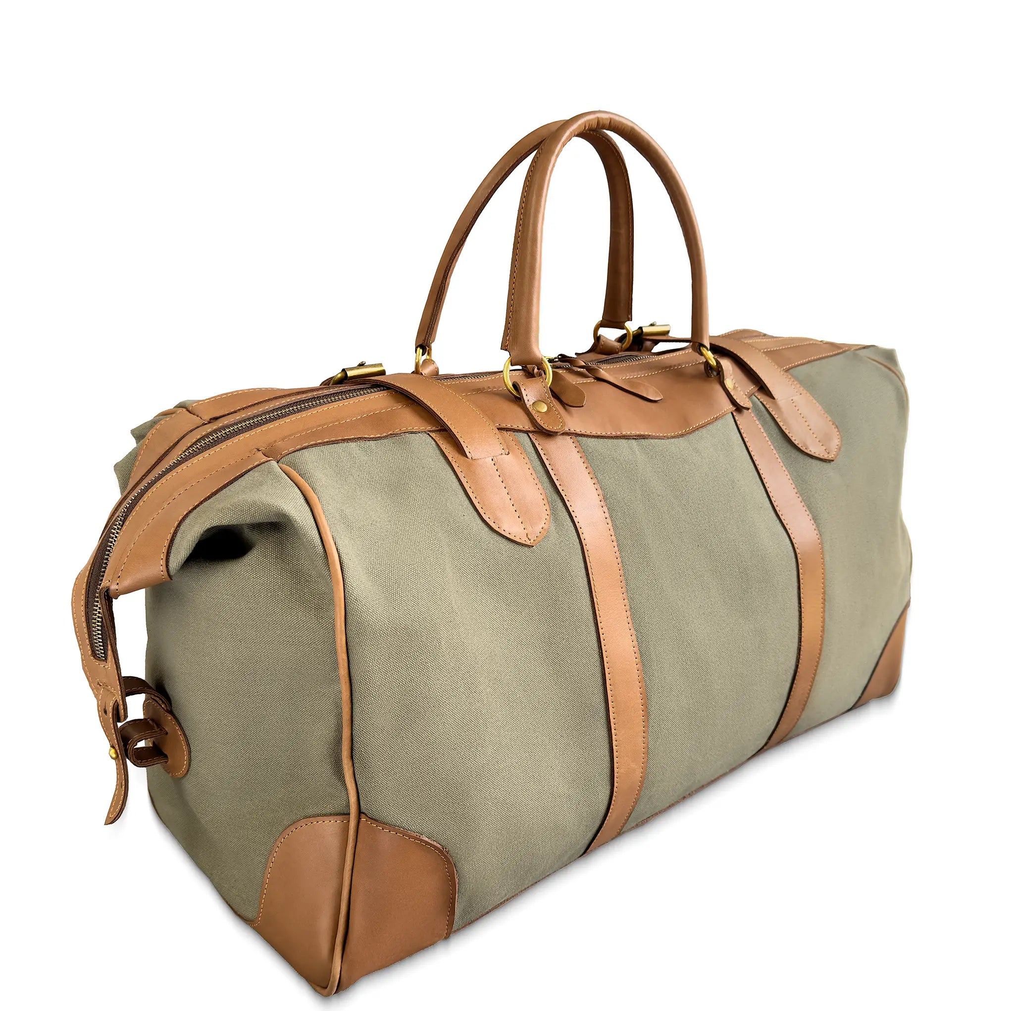 Green duffel bag with brown leather straps and handles on a white background