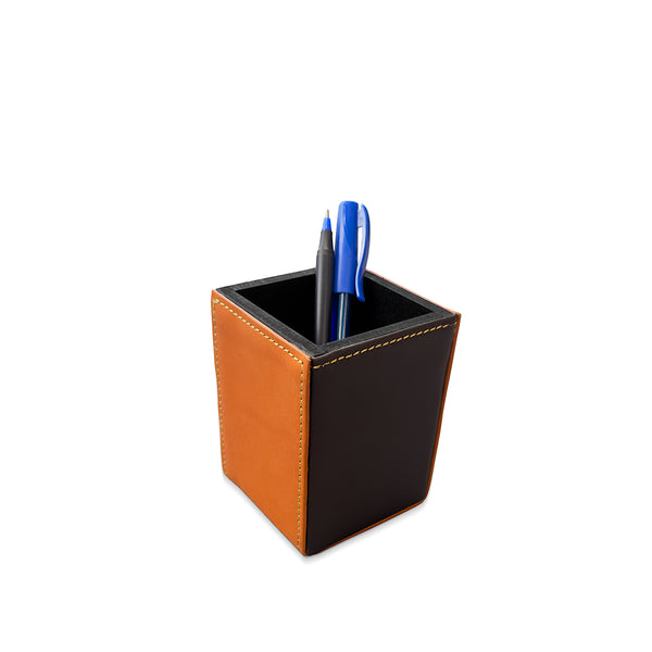 Black and orange pen holder with two pens on a white background