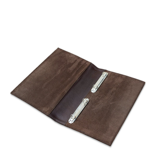 Brown leather folder with metal clips on a white background